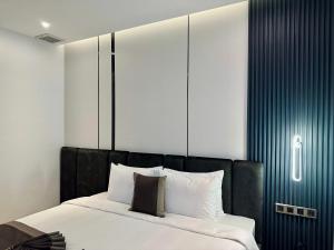 Postel nebo postele na pokoji v ubytování LION 15 Hotel