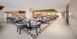 Posezení v ubytování Wanda Jin Hotel Karamay Dushanzi Huiyang
