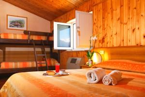 Krevet ili kreveti u jedinici u okviru objekta Hotel Holidays