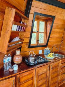 Kuchyň nebo kuchyňský kout v ubytování Aldea Tipi Glamping