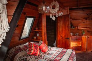 Postel nebo postele na pokoji v ubytování Aldea Tipi Glamping