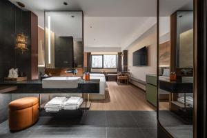 Voodi või voodid majutusasutuse JINGCADIA Hotel Nanjing Confucius Temple toas
