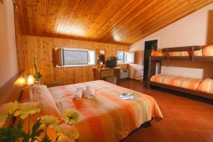Katil atau katil-katil dalam bilik di Hotel Holidays
