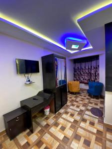 TV a/nebo společenská místnost v ubytování MAGIC MIST RESORT
