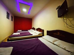 Postel nebo postele na pokoji v ubytování MAGIC MIST RESORT