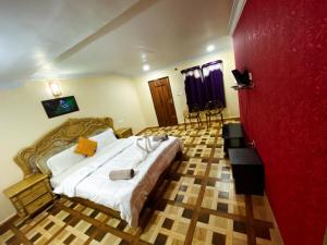 Postel nebo postele na pokoji v ubytování MAGIC MIST RESORT