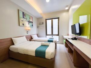 TV a/nebo společenská místnost v ubytování ABC Hotel CEBU