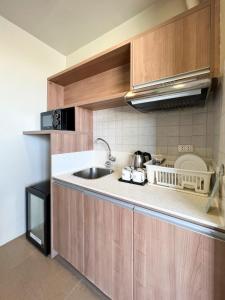 Kuchyň nebo kuchyňský kout v ubytování ABC Hotel CEBU