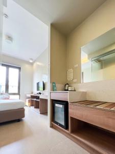 Kuchyň nebo kuchyňský kout v ubytování ABC Hotel CEBU