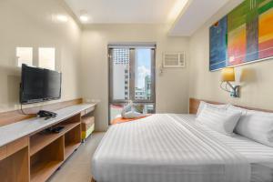TV a/nebo společenská místnost v ubytování ABC Hotel CEBU