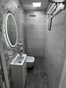 Koupelna v ubytování Premium Khatai Residence Boulevard, Victory Park + 10 fotografií