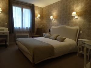 Cama ou camas em um quarto em Castel Fleuri