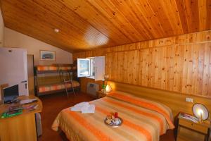 Krevet ili kreveti u jedinici u okviru objekta Hotel Holidays