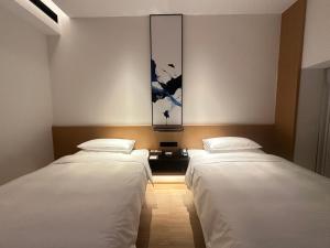Voodi või voodid majutusasutuse Fairfield by Marriott Quanzhou Fengze toas
