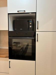 Kuchyň nebo kuchyňský kout v ubytování Суточная аренда + 12 fotografií