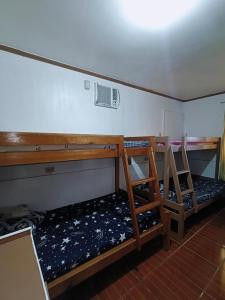 Postel nebo postele na pokoji v ubytování Russville Apartment