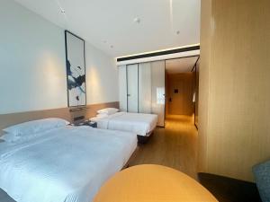 Voodi või voodid majutusasutuse Fairfield by Marriott Quanzhou Fengze toas