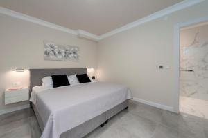 Postel nebo postele na pokoji v ubytování Apartments MaKris No1