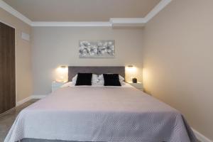 Postel nebo postele na pokoji v ubytování Apartments MaKris No1