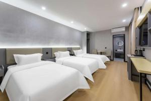 Foto dalla galleria di World Smart Hotel Shandong Cancer Hospital Branch a Jinan