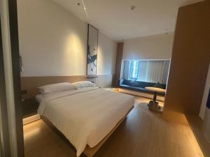 Voodi või voodid majutusasutuse Fairfield by Marriott Quanzhou Fengze toas