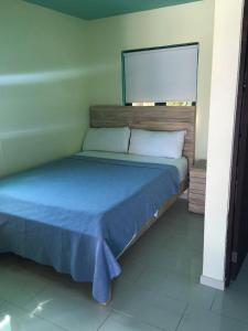 Letto o letti in una camera di Mamacitas Guest House