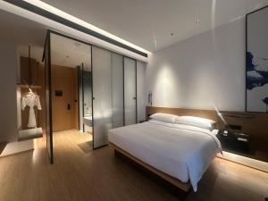 Voodi või voodid majutusasutuse Fairfield by Marriott Quanzhou Fengze toas