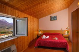 Krevet ili kreveti u jedinici u okviru objekta Hotel Holidays