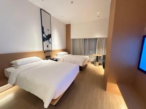 Televiisor ja/või meelelahutuskeskus majutusasutuses Fairfield by Marriott Quanzhou Fengze