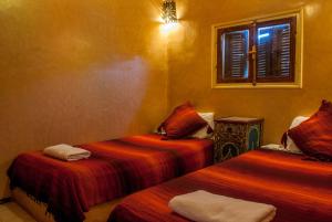 En eller flere senger på et rom på Hôtel Chellal ďOuzoud