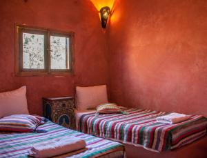 En eller flere senger på et rom på Hôtel Chellal ďOuzoud