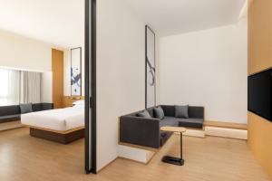 Voodi või voodid majutusasutuse Fairfield by Marriott Quanzhou Fengze toas