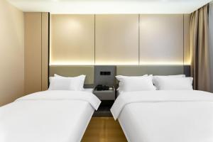 Foto dalla galleria di World Smart Hotel Shandong Cancer Hospital Branch a Jinan