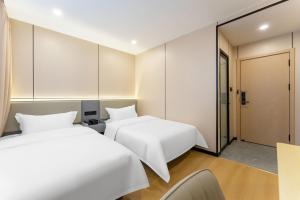 Foto dalla galleria di World Smart Hotel Shandong Cancer Hospital Branch a Jinan