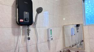 Koupelna v ubytování NEW Xing Yue Hotel 星悦自助酒店 + 25 fotografií