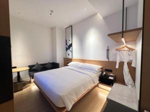 Voodi või voodid majutusasutuse Fairfield by Marriott Quanzhou Fengze toas