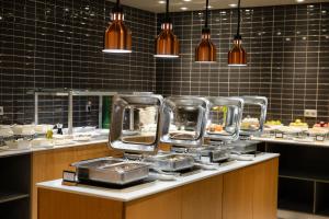 A cozinha ou cozinha compacta de Holiday Inn - Aktau - Seaside by IHG
