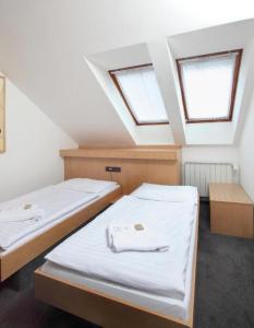 Postel nebo postele na pokoji v ubytování Hotel Rottal