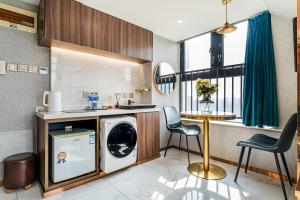 Kuchyň nebo kuchyňský kout v ubytování 云享城居 SKY高空Loft公寓酒店 春熙路九眼桥店