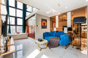 Posezení v ubytování 云享城居 SKY高空Loft公寓酒店 春熙路九眼桥店