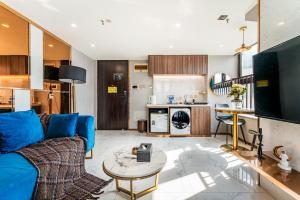 Kuchyň nebo kuchyňský kout v ubytování 云享城居 SKY高空Loft公寓酒店 春熙路九眼桥店