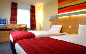 A bed or beds in a room at Holiday Inn Express London Golders Green, an IHG Hotel 