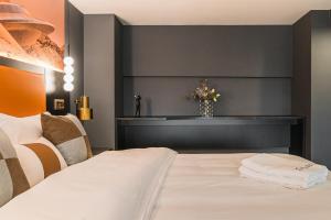 Postel nebo postele na pokoji v ubytování 云享城居 SKY高空Loft公寓酒店 春熙路九眼桥店