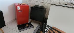 Kuchyň nebo kuchyňský kout v ubytování Aconchego do Lar Residencial