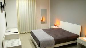 Postel nebo postele na pokoji v ubytování Matera Sassi Rooms 21/a e 21/b