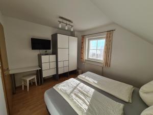 Postel nebo postele na pokoji v ubytování Ferienwohnung Schupfer