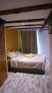 Postel nebo postele na pokoji v ubytování Mas de la Borie -Chambre d'hôtes