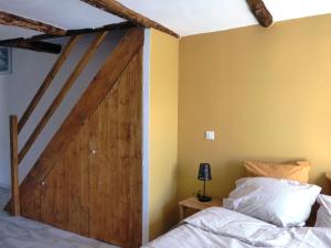 Postel nebo postele na pokoji v ubytování Mas de la Borie -Chambre d'hôtes
