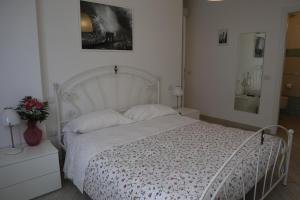 Letto o letti in una camera di Camera & Caffè Cenni