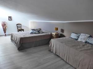Postel nebo postele na pokoji v ubytování Mas de la Borie -Chambre d'hôtes